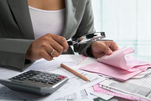 Woman checking bills
