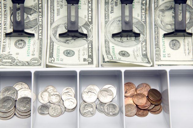 Open cash drawer with money