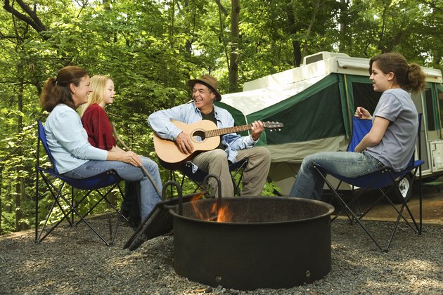 Family around campfire