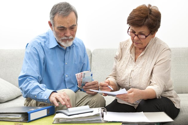 couple calculating home finances
