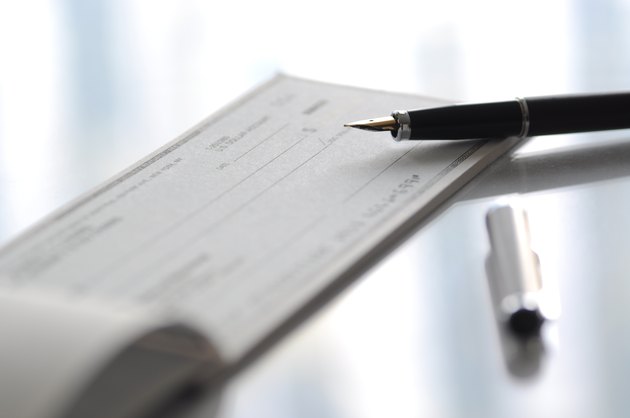 Fountain pen and cheque