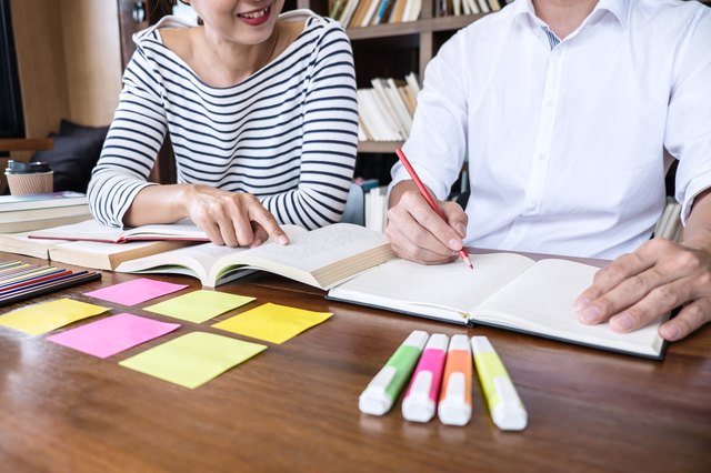 Two very organized students studying together