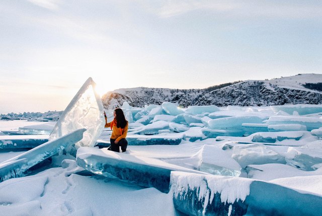 Woman exploring broken sea ice