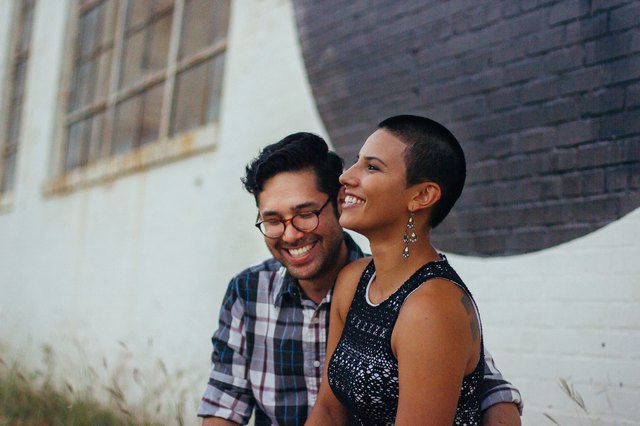 Cute Latinx couple smiling together