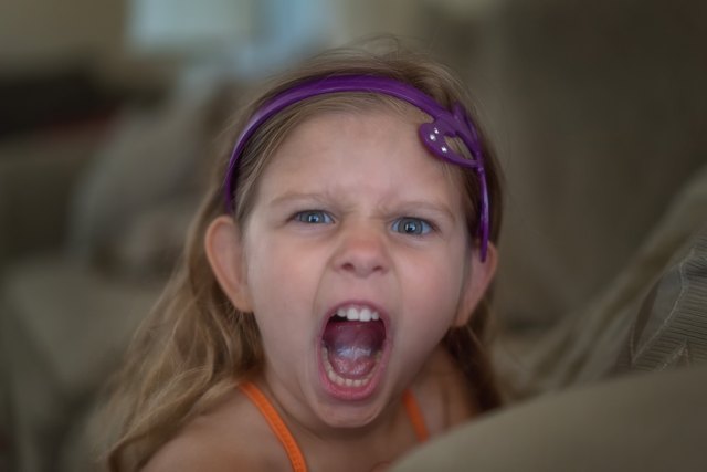Angry child yelling at the camera