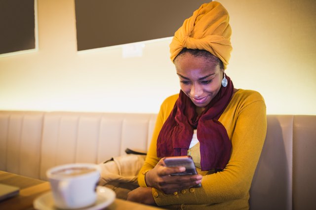 Young African female students on coffee break.