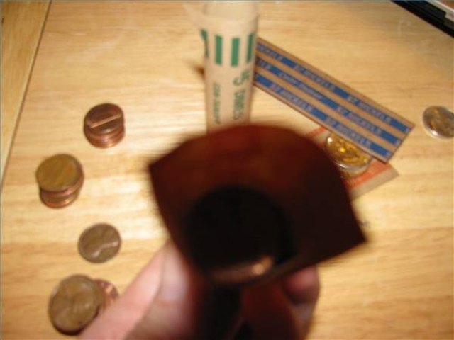 How to Put Coins in Holders | Sapling.com