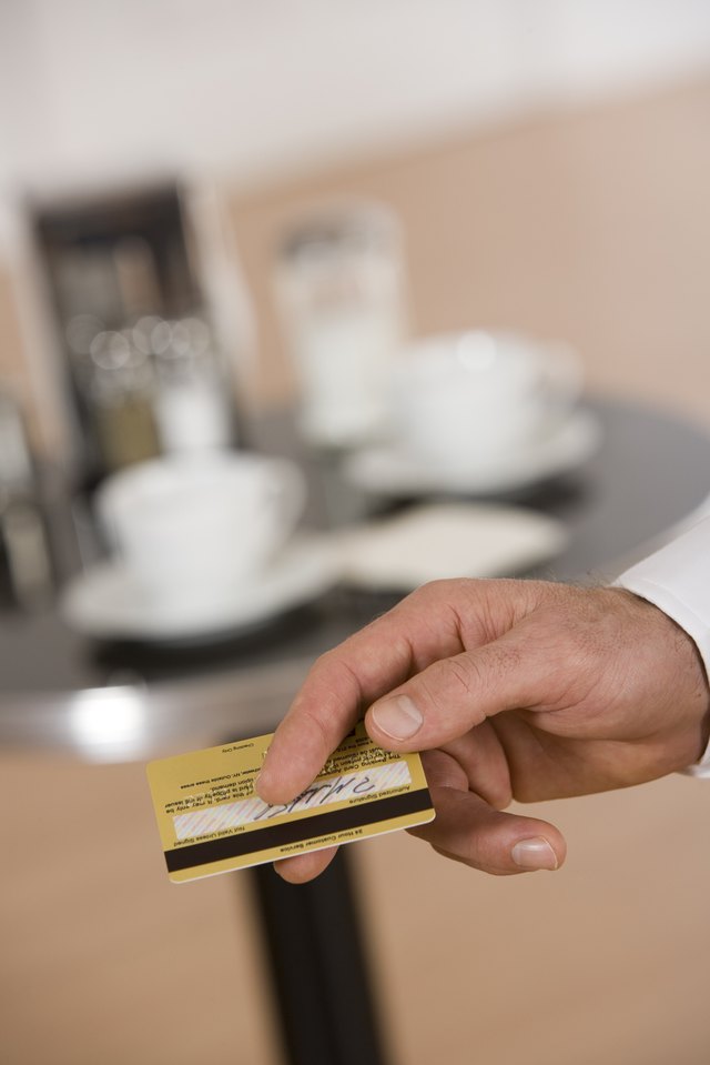 Hand holding credit card