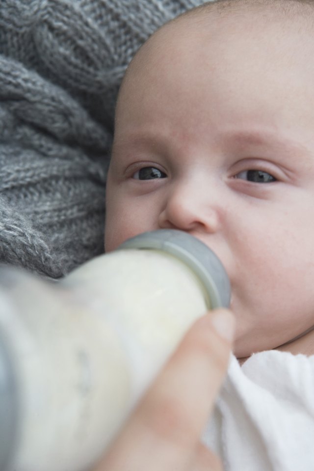 Close-up of a baby drinking a bottle