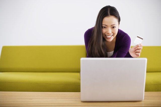 Smiling woman shopping online