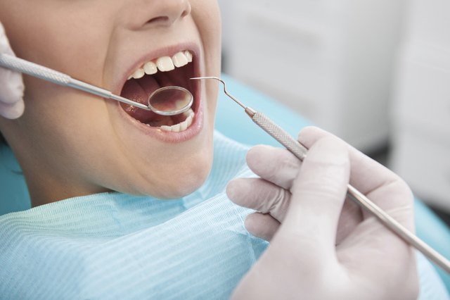 Little patient at dentist office.