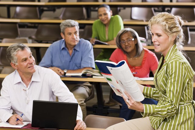Teacher and students in lecture hall