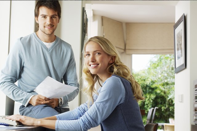 Young Couple Looking at Documents