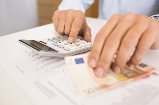 Man doing his accounting, financial adviser working