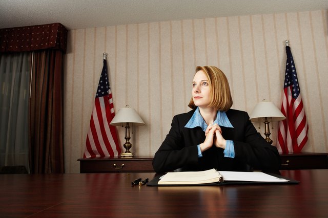 Pensive businesswoman at desk
