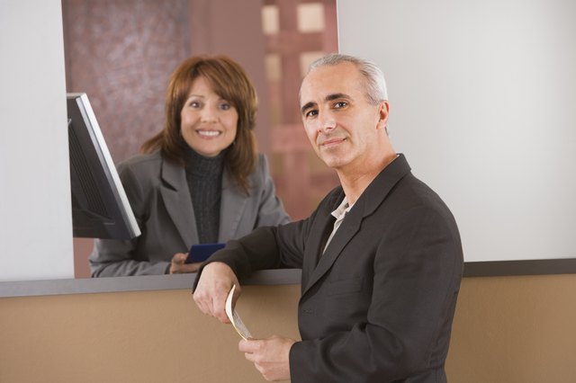 Man and bank teller