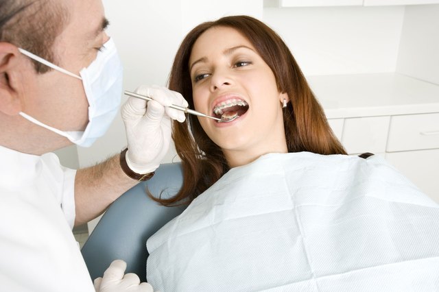 Patient being examined by dentist
