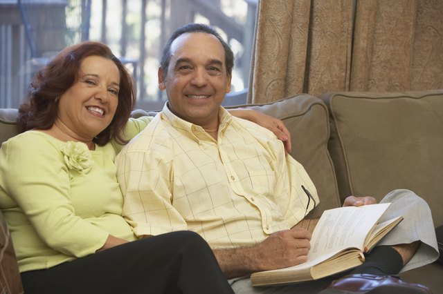 Portrait of a mature couple sitting together on the couch