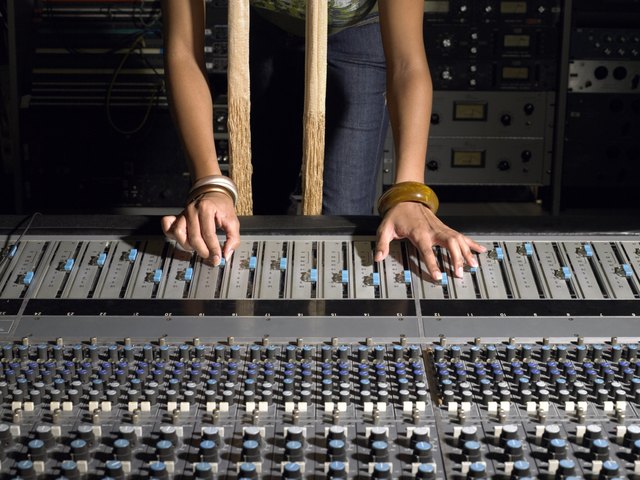 Woman using mixing desk