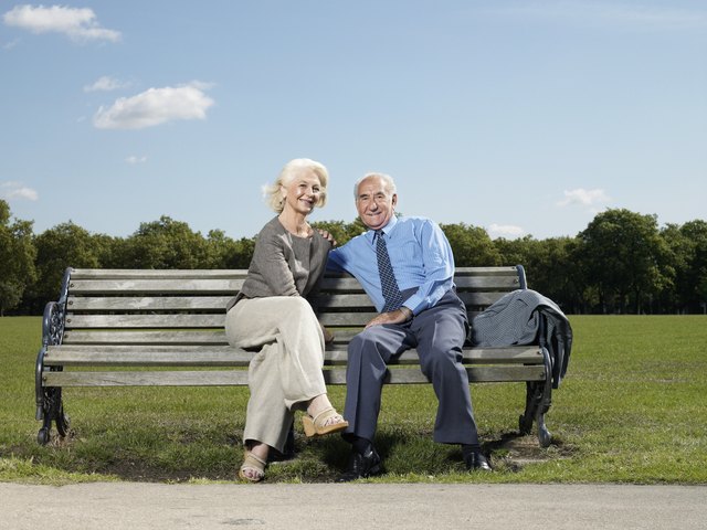 Elderly couple on a park bench