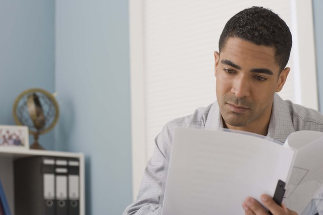 Businessman with paper documents