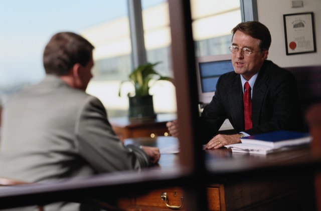 Businessmen Talking in an Office