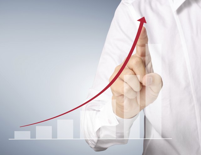 Business man pushing graph