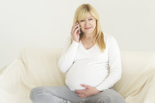 Pregnant woman relaxing on the sofa