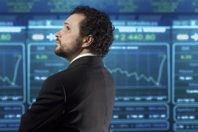businessman with beard and black suit in the stockmarket, back