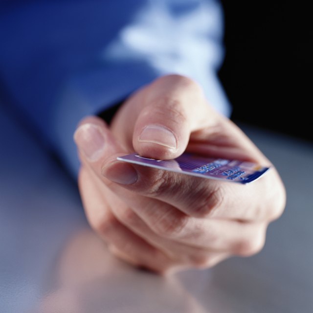 Hand Holding a Credit Card