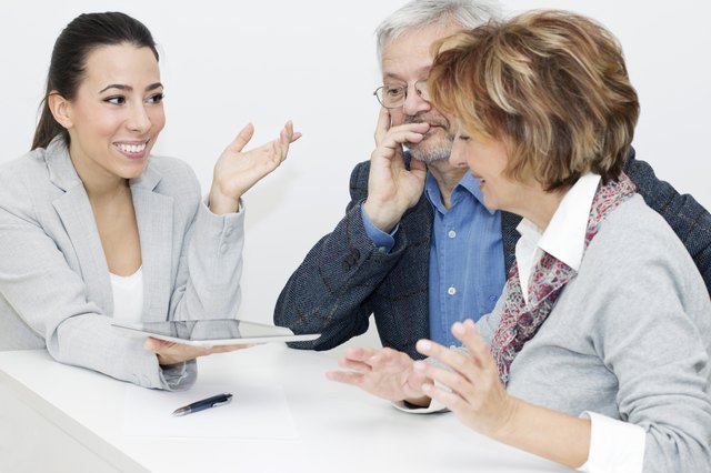 Mature Couple in Meeting With Advisor