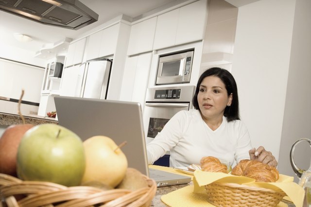 Mature woman working on a laptop