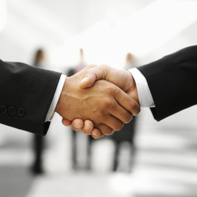 two businessmen shaking hands