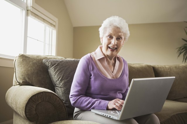 Woman smiling with laptop