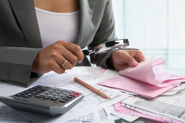 Woman checking bills
