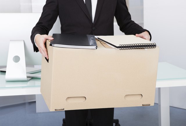 Businessman Holding Box