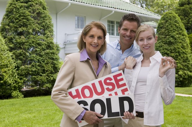 Couple with a real estate agent