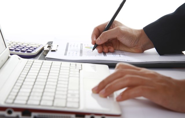 Business woman analyzing financial data