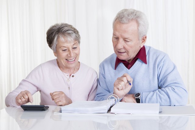 Senior Couple Calculating Budget